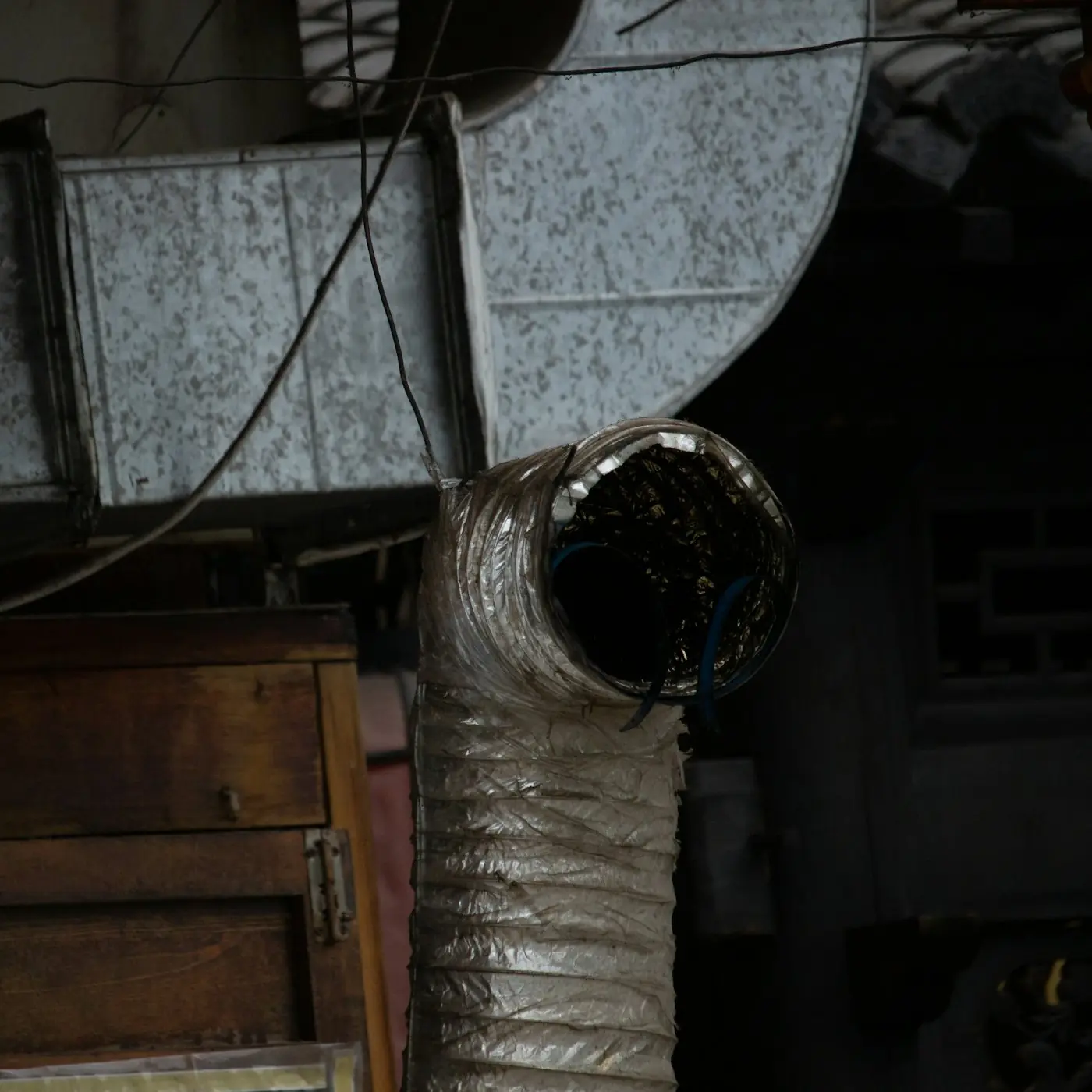 Dirty flexible air duct with dust buildup